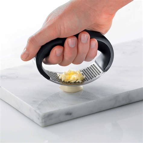 When slicing these coins, your goal is to cut across the grain of the fibers. . Garlic press walmart